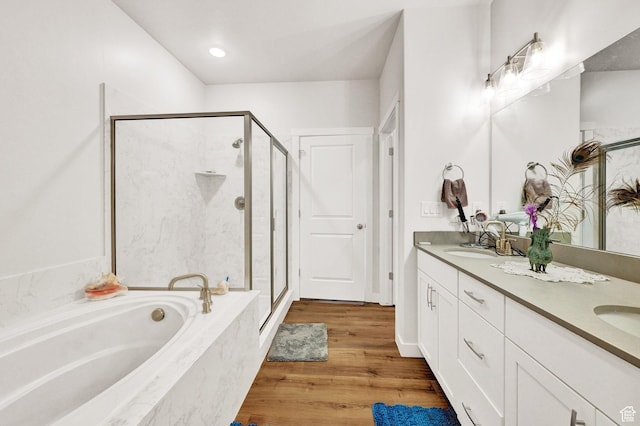 114 N 3830 W, West Point, UT 84015 - bathroom with a shower stall, a garden tub, double vanity, and wood finished floors