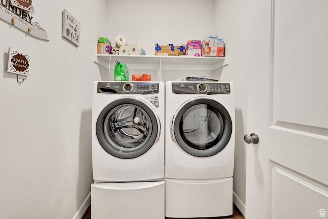 114 N 3830 W, West Point, UT 84015 - washroom featuring washer and dryer, wood finished floors, and baseboards