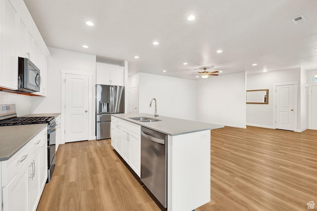 114 N 3830 W, West Point, UT 84015 - kitchen featuring stainless steel appliances, light wood-style flooring, a ceiling fan, recessed lighting, and a kitchen island with sink