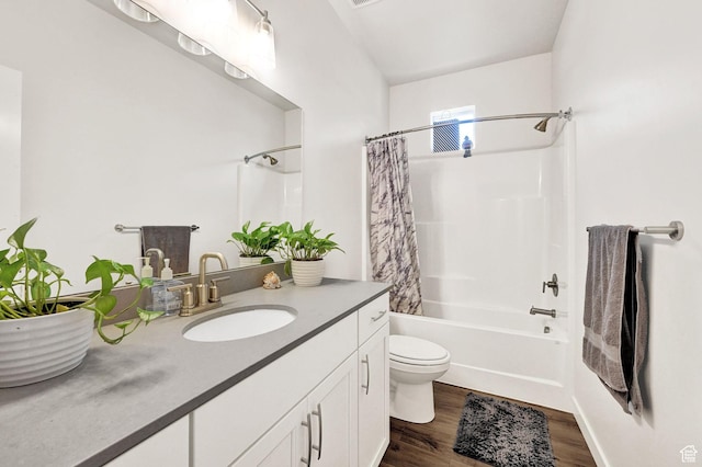 114 N 3830 W, West Point, UT 84015 - bathroom featuring wood finished floors, toilet, shower / bathtub combination with curtain, and vanity