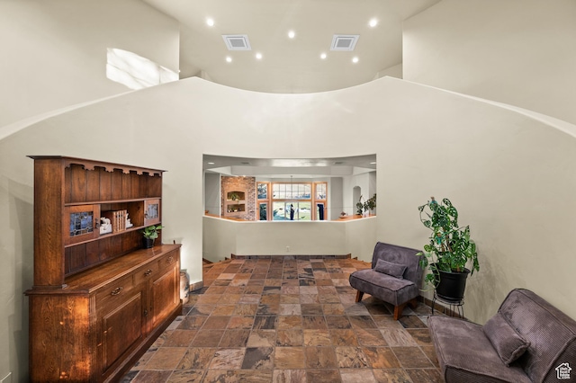 9266 Par Ct, Park City, UT 84098 - sitting room with a high ceiling, dark stone finish floors, and recessed lighting