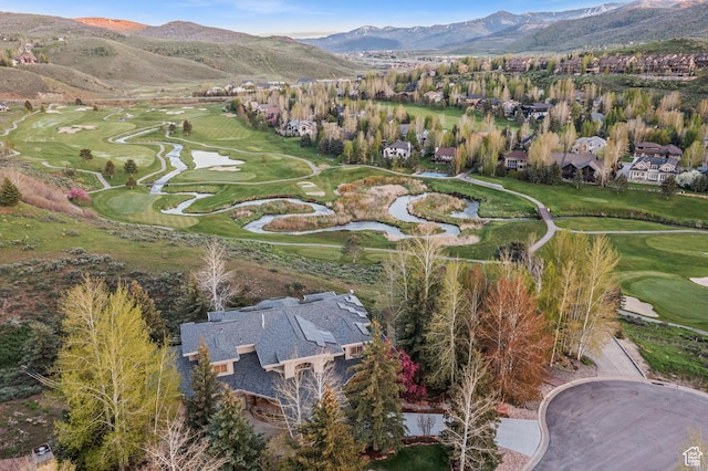 9266 Par Ct, Park City, UT 84098 - aerial view of property and surrounding area featuring a golf club, a mountainous background, and nearby suburban area