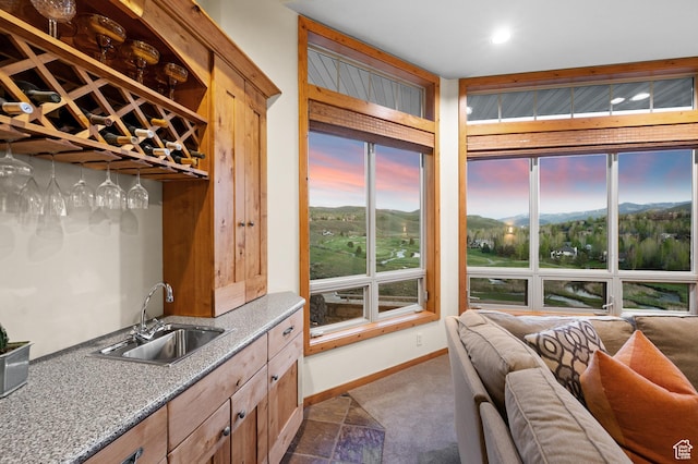 9266 Par Ct, Park City, UT 84098 - kitchen featuring a sink, dark carpet, open floor plan, baseboards, and recessed lighting