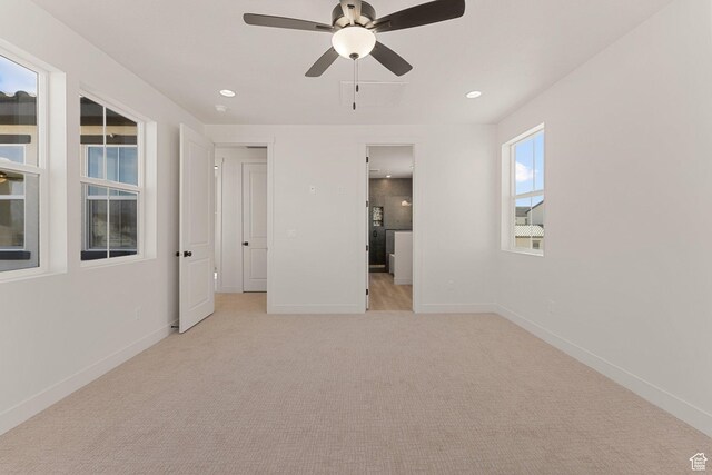669 Juniper Hill Dr, St George, UT 84790 - unfurnished bedroom with recessed lighting, light colored carpet, baseboards, and a ceiling fan