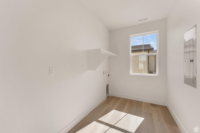 669 Juniper Hill Dr, St George, UT 84790 - spare room featuring light wood-style flooring, baseboards, and electric panel