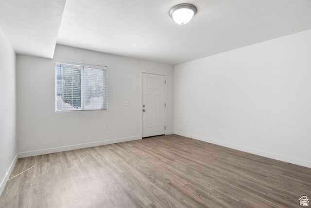 236 E 630 N, Vineyard, UT 84059 - unfurnished room with wood finished floors and baseboards