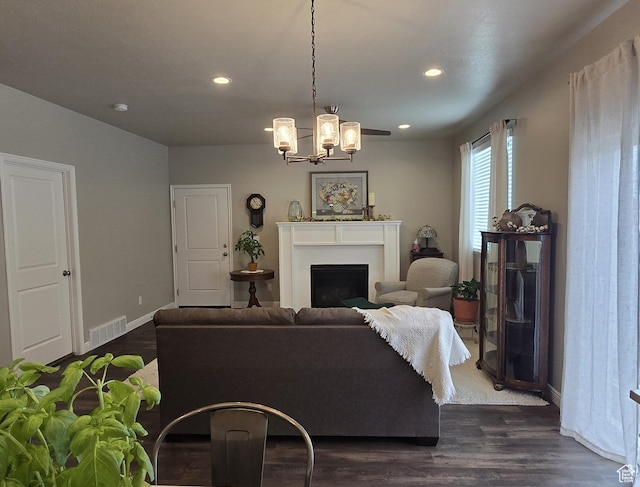 250 W 1200 S Unit 127, Tremonton, UT 84337 - living room with recessed lighting, a chandelier, dark wood-style floors, and a fireplace