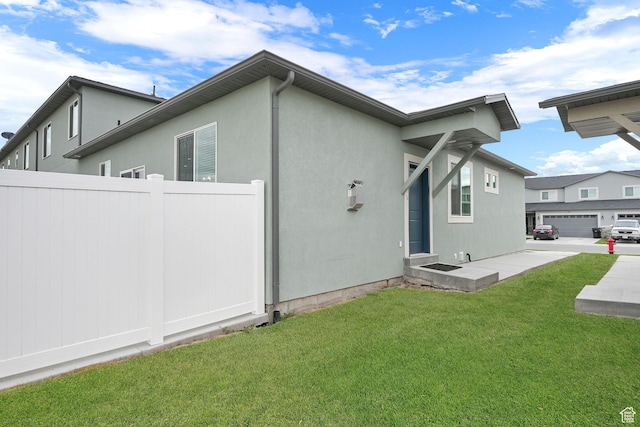 250 W 1200 S Unit 127, Tremonton, UT 84337 - rear view of house with stucco siding