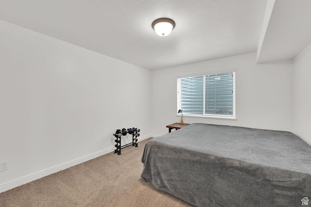 250 W 1200 S Unit 127, Tremonton, UT 84337 - bedroom featuring light carpet and baseboards