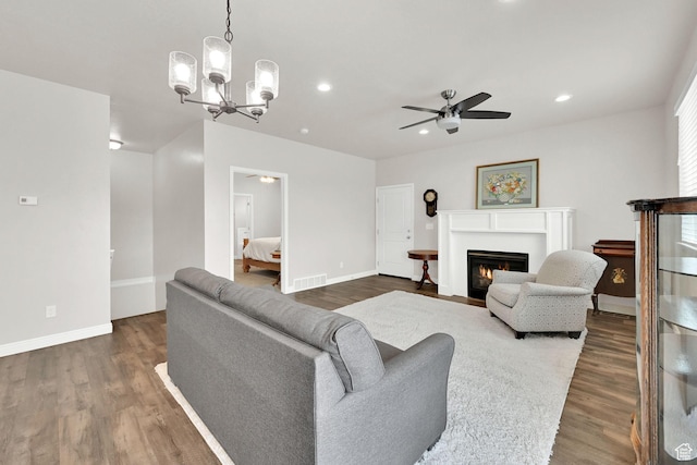 250 W 1200 S Unit 127, Tremonton, UT 84337 - living area with a ceiling fan, dark wood-style flooring, recessed lighting, and a glass covered fireplace