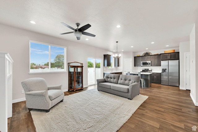 250 W 1200 S Unit 127, Tremonton, UT 84337 - living area featuring ceiling fan, recessed lighting, a chandelier, and dark wood-style floors