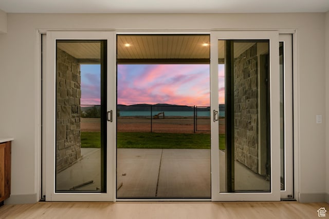 35 E 150 S Unit 202C, Garden City, UT 84028 - doorway to outside with light wood-style floors and a water view