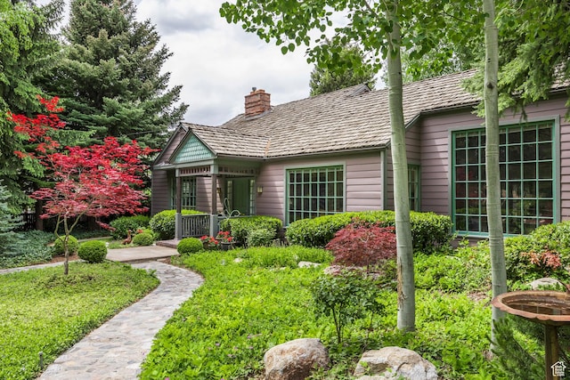 view of front of house with a chimney