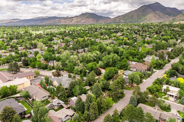 aerial view of residential area with a mountainous background