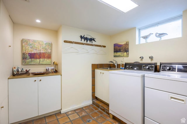 washroom featuring cabinet space, independent washer and dryer, tile patterned floors, and recessed lighting