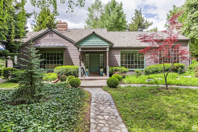 view of front of property with a chimney
