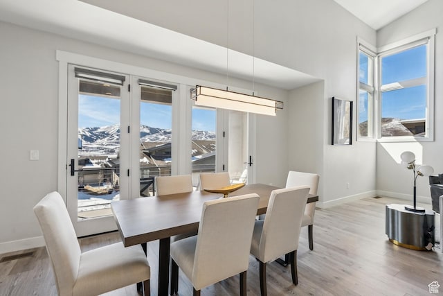 363 E Overlook Loop E Unit 22, Hideout, UT 84036 - dining area featuring baseboards and light wood-type flooring