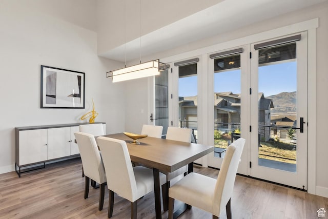 363 E Overlook Loop E Unit 22, Hideout, UT 84036 - dining space featuring light wood-style flooring and baseboards