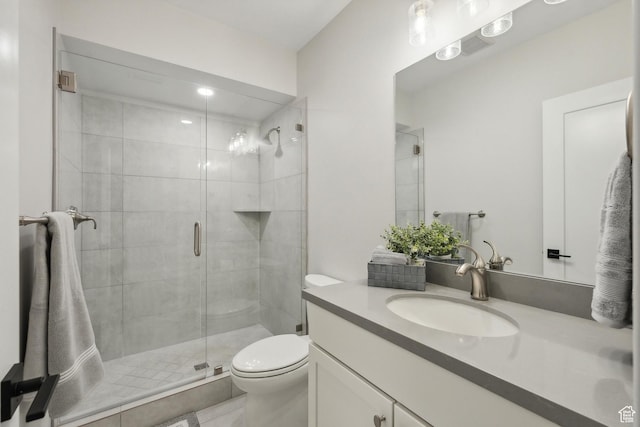 363 E Overlook Loop E Unit 22, Hideout, UT 84036 - bathroom featuring toilet, vanity, and a stall shower