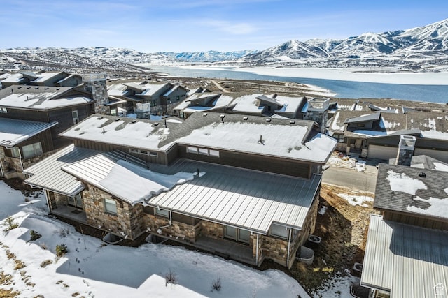 363 E Overlook Loop E Unit 22, Hideout, UT 84036 - snowy aerial view with a mountain view and a residential view