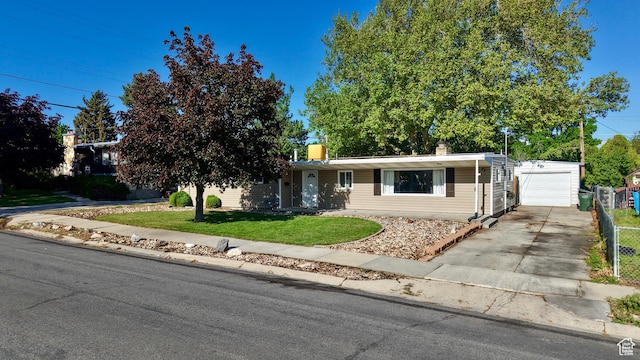 view of front of home featuring concrete driveway and a chimney