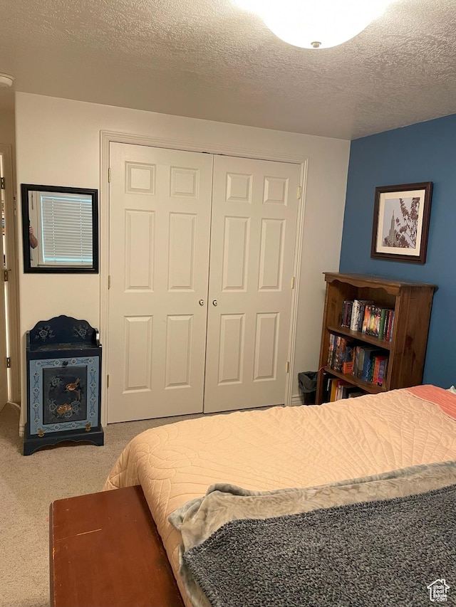 2285 S 450 W, Perry, UT 84302 - carpeted bedroom featuring a textured ceiling and a closet