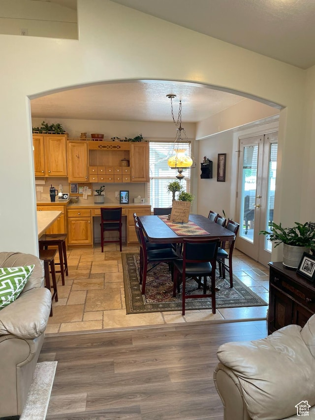 2285 S 450 W, Perry, UT 84302 - dining room featuring a chandelier, french doors, and arched walkways