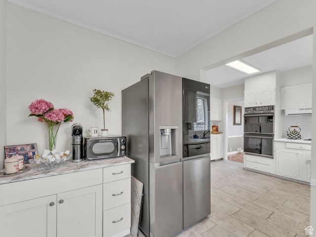 941 S Connor St E, Salt Lake City, UT 84108 - kitchen featuring stainless steel refrigerator with ice dispenser, white cabinetry, ornamental molding, and extractor fan