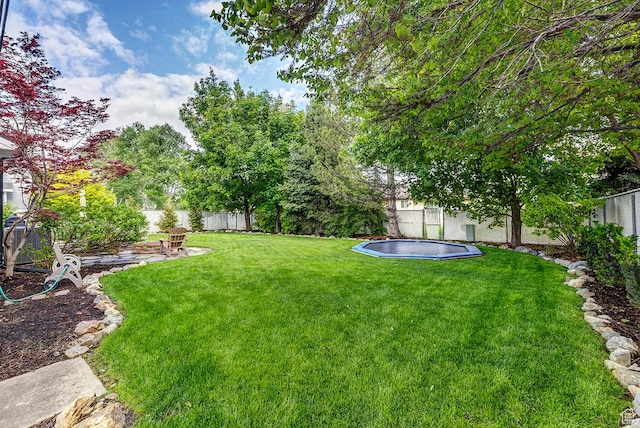 88 W 780 S, Centerville, UT 84014 - view of yard with a trampoline and a patio area