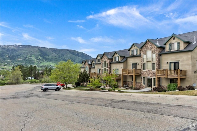 3521 N Fox Run Unit 812, Eden, UT 84310 - view of asphalt road featuring a residential view, a mountain view, and sidewalks
