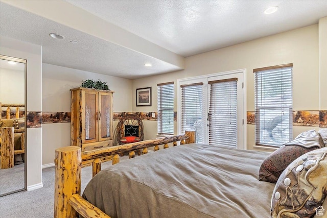 3521 N Fox Run Unit 812, Eden, UT 84310 - bedroom featuring carpet flooring, multiple windows, access to exterior, and recessed lighting