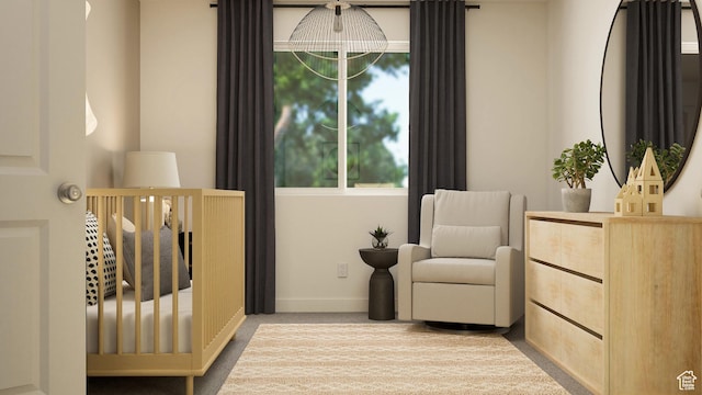 sitting room with carpet floors and baseboards