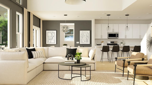 living room featuring light wood-style flooring and recessed lighting