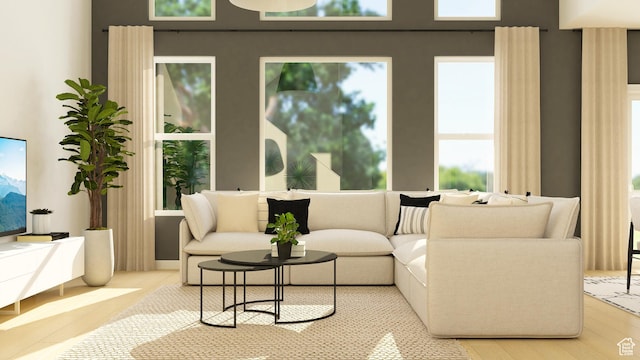 living room featuring light wood-style flooring and plenty of natural light
