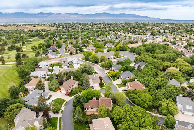 aerial perspective of suburban area with mountains