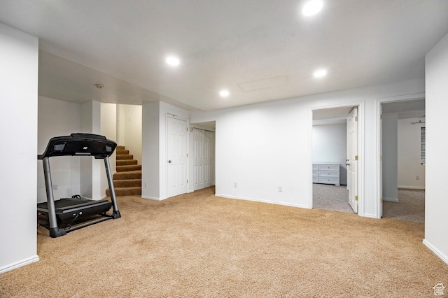 workout area featuring recessed lighting, carpet, and baseboards