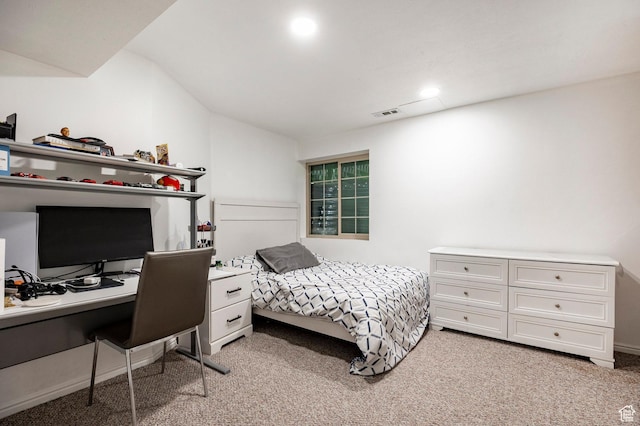 bedroom featuring light colored carpet, vaulted ceiling, an office area, and recessed lighting