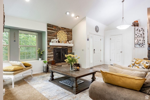living room with a fireplace, carpet, and high vaulted ceiling