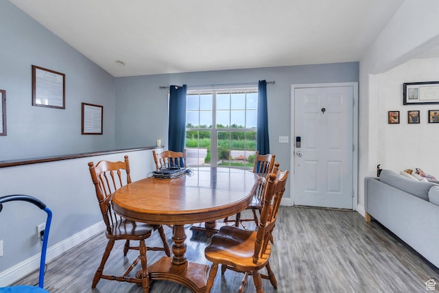 606 N 560 W, Santaquin, UT 84655 - dining area with light wood-style flooring, baseboards, and lofted ceiling