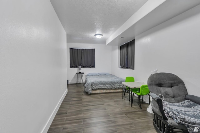 606 N 560 W, Santaquin, UT 84655 - bedroom featuring a textured ceiling, baseboards, and wood finished floors