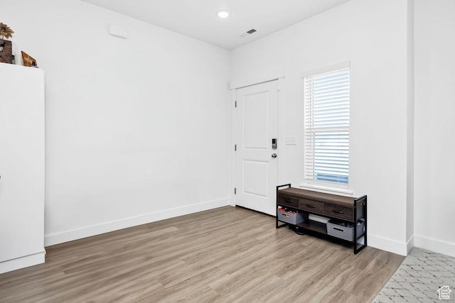 3137 S 225 W Unit 404, Nibley, UT 84321 - foyer entrance featuring light wood-style flooring, baseboards, plenty of natural light, and recessed lighting