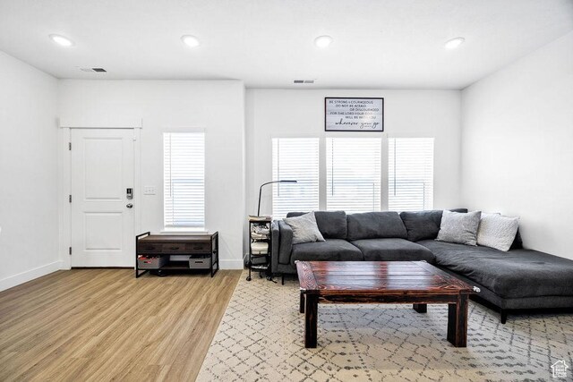 3137 S 225 W Unit 404, Nibley, UT 84321 - living area with light wood-style floors, recessed lighting, and baseboards