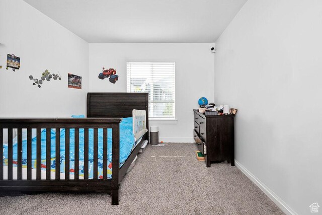 3137 S 225 W Unit 404, Nibley, UT 84321 - bedroom featuring carpet floors and baseboards