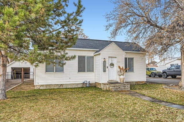 12418 S Redwood Rd, Riverton, UT 84065 - bungalow-style house featuring a front yard and a shingled roof