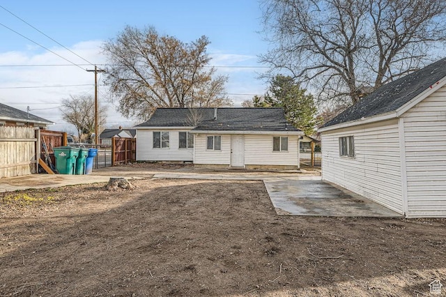 12418 S Redwood Rd, Riverton, UT 84065 - back of property featuring a patio area