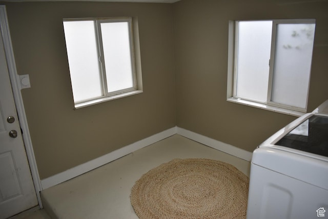12418 S Redwood Rd, Riverton, UT 84065 - washroom with baseboards and washer / clothes dryer