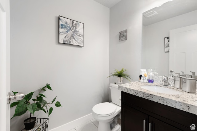 4483 S Parkbury Way, Salt Lake City, UT 84129 - bathroom with tile patterned flooring, toilet, vanity, and baseboards