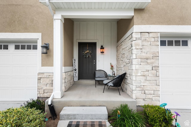 4483 S Parkbury Way, Salt Lake City, UT 84129 - entrance to property with stone siding, a garage, board and batten siding, and stucco siding