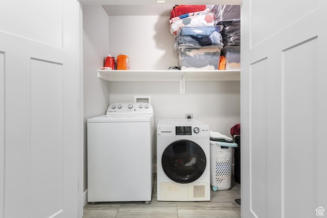 4483 S Parkbury Way, Salt Lake City, UT 84129 - washroom featuring washing machine and clothes dryer