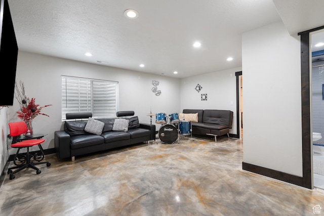 4483 S Parkbury Way, Salt Lake City, UT 84129 - living area with finished concrete floors, recessed lighting, and baseboards